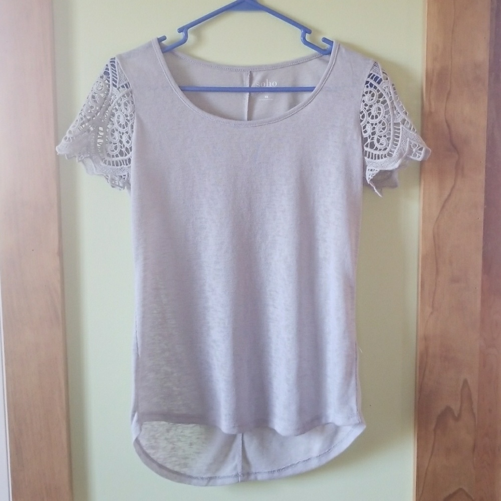 New York & Co.knit blouse with lace sleeves. NWOT.